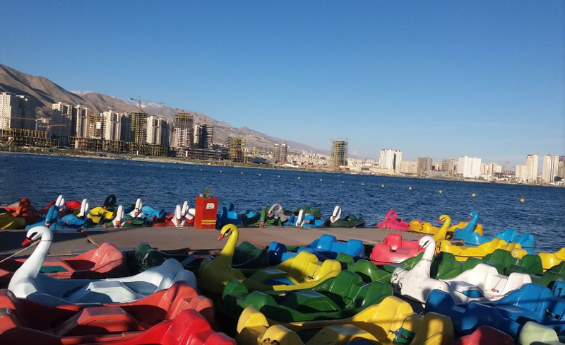 Boat riding in Chitgar lake in Tehran