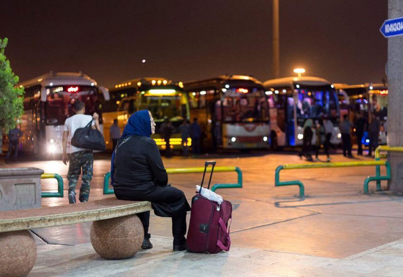 A woman passenger at  West Bus Terminal 