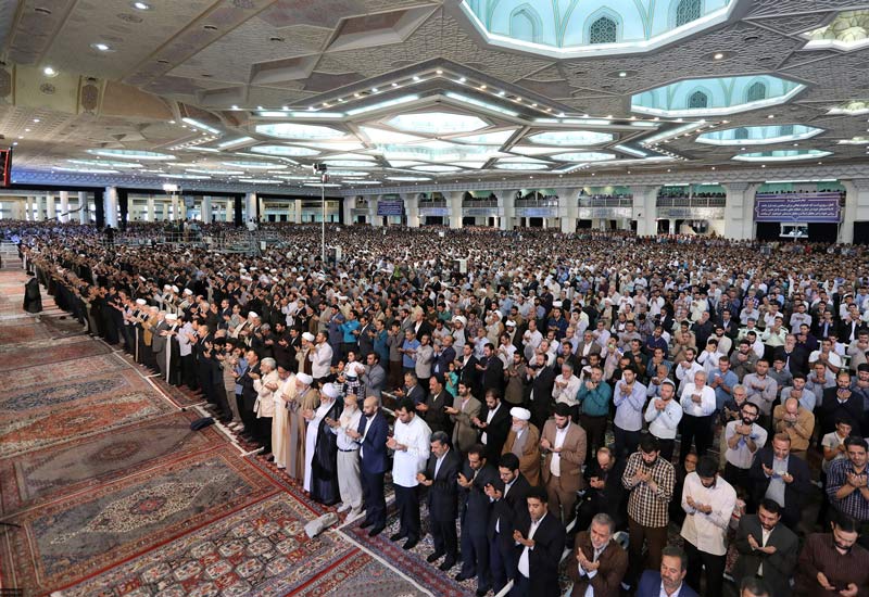 prayers inside of Tehran Mosalla  , one of the best religious site and mosques near  Parsian Azadi Hotel