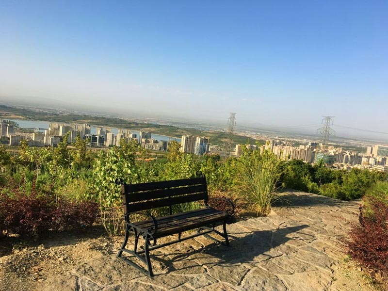 Wooden chair in Tehran Waterfall Park