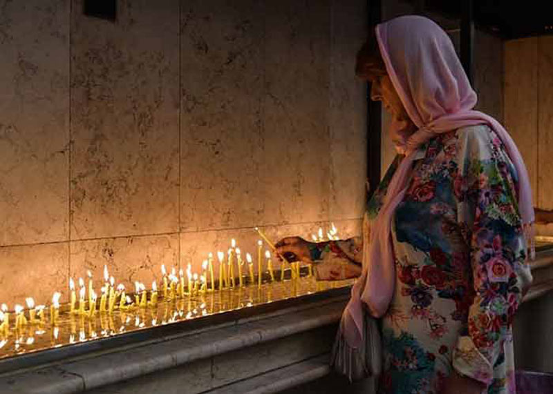 light the candle at Saint Sarkis Cathedral  in Tehran